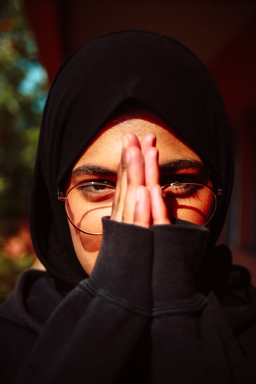 woman wearing hijab and eyeglasses