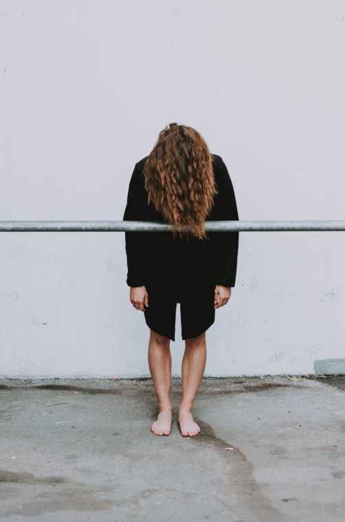 woman standing near wall