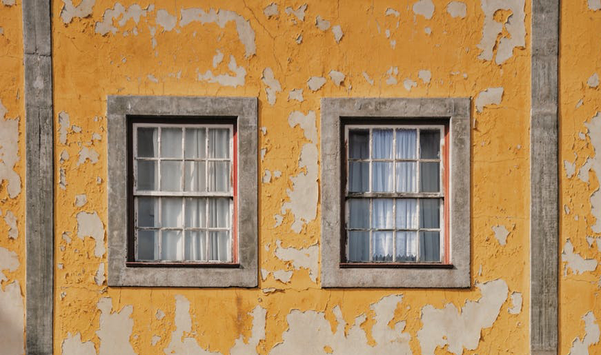 yellow and white concrete building