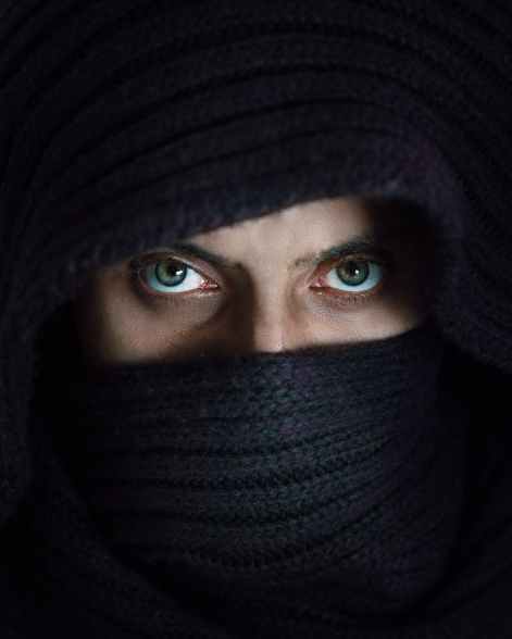 photography of person wearing black hijab